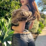 Leaked Andrea Botez Models Sultry Cat-Inspired Leather Ensemble